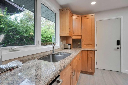 2704 Chandler Road Nw, Calgary, AB - Indoor Photo Showing Kitchen With Double Sink