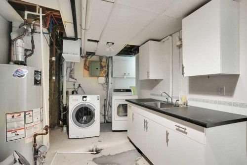 2704 Chandler Road Nw, Calgary, AB - Indoor Photo Showing Laundry Room