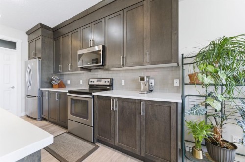 9 Sage Bluff Rise Nw, Calgary, AB - Indoor Photo Showing Kitchen With Stainless Steel Kitchen