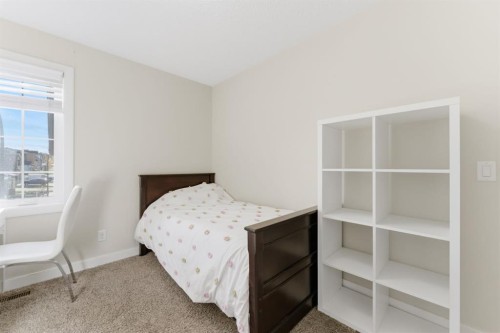 9 Sage Bluff Rise Nw, Calgary, AB - Indoor Photo Showing Bedroom