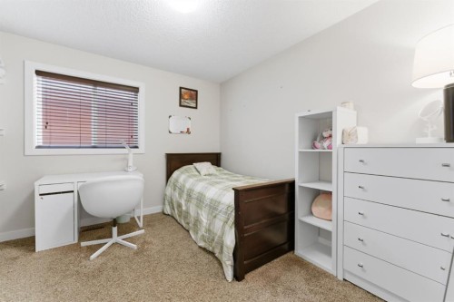 9 Sage Bluff Rise Nw, Calgary, AB - Indoor Photo Showing Bedroom