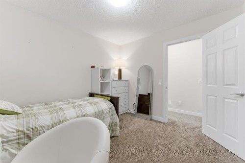 9 Sage Bluff Rise Nw, Calgary, AB - Indoor Photo Showing Bedroom