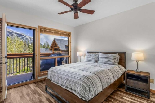 310-600 Spring Creek Drive, Canmore, AB - Indoor Photo Showing Bedroom