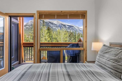310-600 Spring Creek Drive, Canmore, AB - Indoor Photo Showing Bedroom