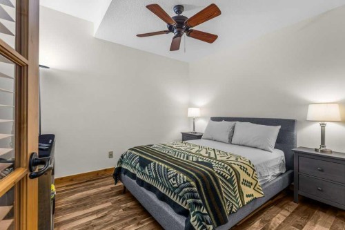 310-600 Spring Creek Drive, Canmore, AB - Indoor Photo Showing Bedroom