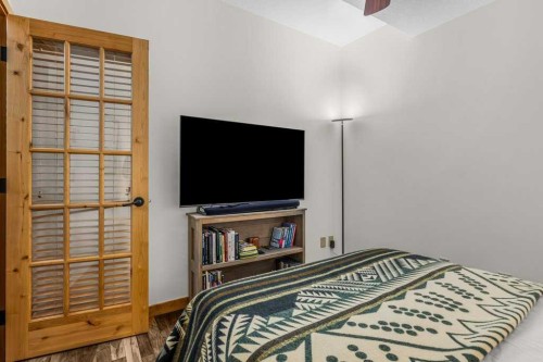 310-600 Spring Creek Drive, Canmore, AB - Indoor Photo Showing Bedroom