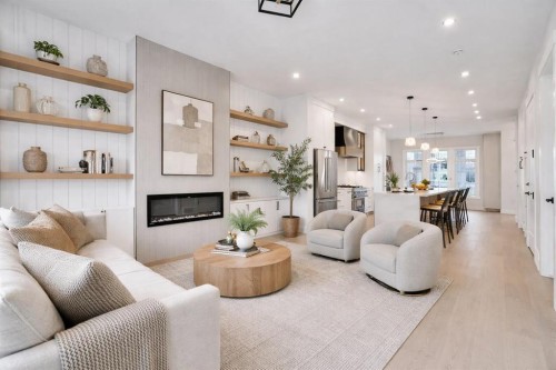 8528 47 Avenue Nw, Calgary, AB - Indoor Photo Showing Living Room With Fireplace
