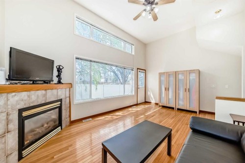 31 Harvest Oak Circle Ne, Calgary, AB - Indoor Photo Showing Other Room With Fireplace