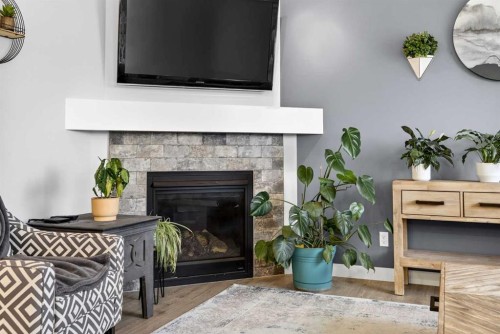 68 Nolancrest Circle Nw, Calgary, AB - Indoor Photo Showing Living Room With Fireplace