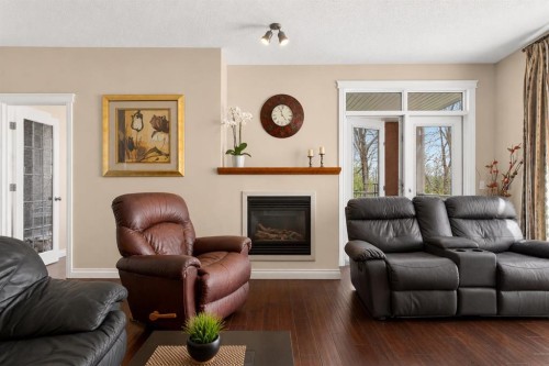 7305-14 Hemlock Crescent Sw, Calgary, AB - Indoor Photo Showing Living Room With Fireplace