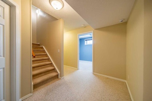 76 Sunset Crescent, Okotoks, AB - Indoor Photo Showing Other Room