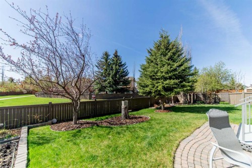 76 Sunset Crescent, Okotoks, AB - Outdoor With Backyard