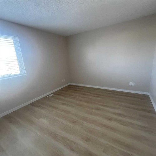 140 Martindale Boulevard Ne, Calgary, AB - Indoor Photo Showing Other Room