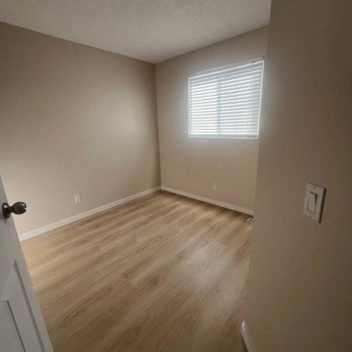 140 Martindale Boulevard Ne, Calgary, AB - Indoor Photo Showing Other Room