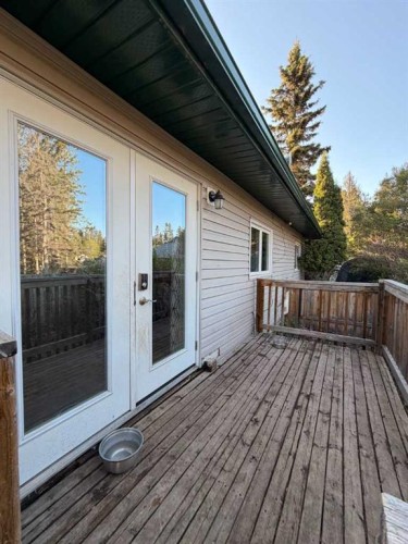 987 1 Avenue, Sundre, AB - Outdoor With Deck Patio Veranda With Exterior