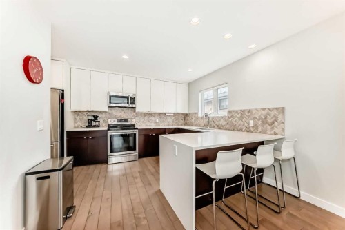 67 30 Avenue Sw, Calgary, AB - Indoor Photo Showing Kitchen With Stainless Steel Kitchen With Upgraded Kitchen