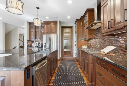 12 Aspen Cliff Close Sw, Calgary, AB - Indoor Photo Showing Kitchen With Upgraded Kitchen