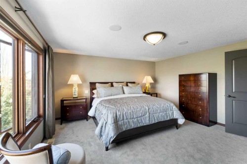 12 Aspen Cliff Close Sw, Calgary, AB - Indoor Photo Showing Bedroom