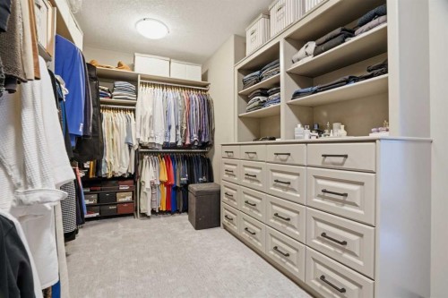 12 Aspen Cliff Close Sw, Calgary, AB - Indoor With Storage