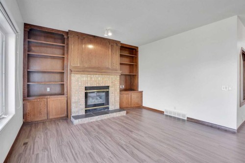 9143 Edgebrook Drive Nw, Calgary, AB - Indoor Photo Showing Living Room With Fireplace
