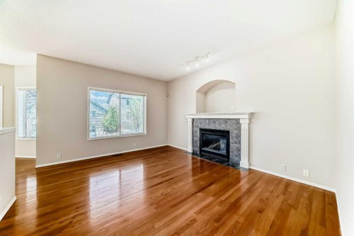 68 Scenic View Close Nw, Calgary, AB - Indoor Photo Showing Living Room With Fireplace