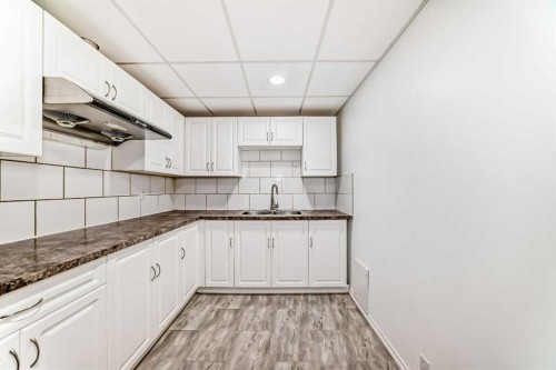 68 Scenic View Close Nw, Calgary, AB - Indoor Photo Showing Kitchen With Double Sink
