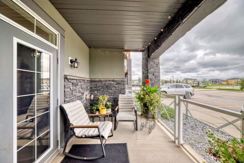 111-1005B Westmount Drive, Strathmore, AB - Outdoor With Deck Patio Veranda With Exterior
