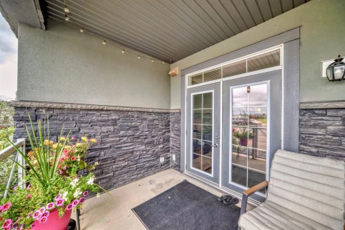 111-1005B Westmount Drive, Strathmore, AB - Outdoor With Deck Patio Veranda With Exterior