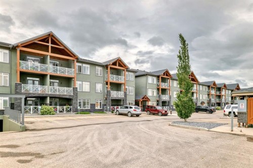 111-1005B Westmount Drive, Strathmore, AB - Outdoor With Facade