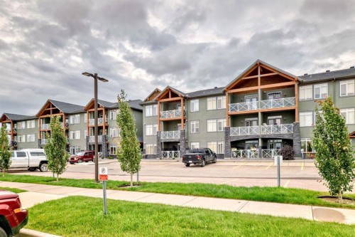 111-1005B Westmount Drive, Strathmore, AB - Outdoor With Facade