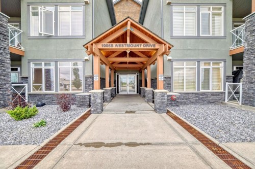 111-1005B Westmount Drive, Strathmore, AB - Outdoor With Facade