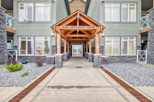 111-1005B Westmount Drive, Strathmore, AB - Outdoor With Facade