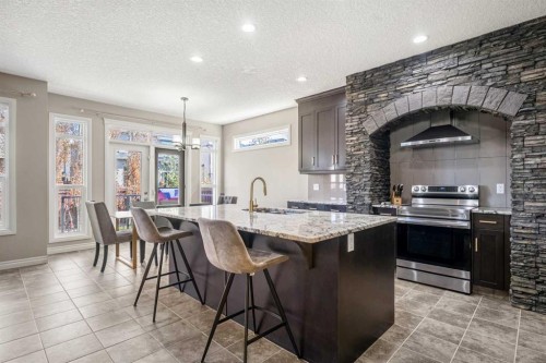 495 Cranford Drive Se, Calgary, AB - Indoor Photo Showing Kitchen With Upgraded Kitchen