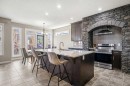 495 Cranford Drive Se, Calgary, AB  - Indoor Photo Showing Kitchen With Upgraded Kitchen 