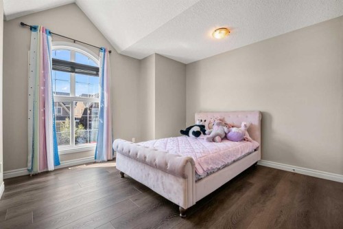 495 Cranford Drive Se, Calgary, AB - Indoor Photo Showing Bedroom