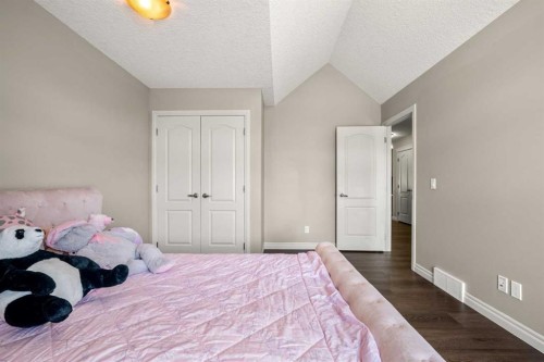 495 Cranford Drive Se, Calgary, AB - Indoor Photo Showing Bedroom