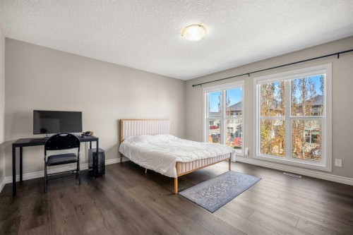 495 Cranford Drive Se, Calgary, AB - Indoor Photo Showing Bedroom