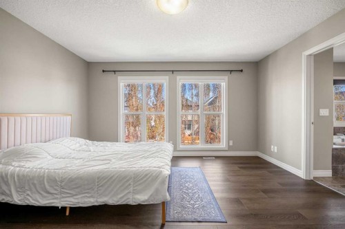 495 Cranford Drive Se, Calgary, AB - Indoor Photo Showing Bedroom