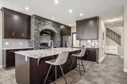 495 Cranford Drive Se, Calgary, AB - Indoor Photo Showing Kitchen With Stainless Steel Kitchen With Upgraded Kitchen