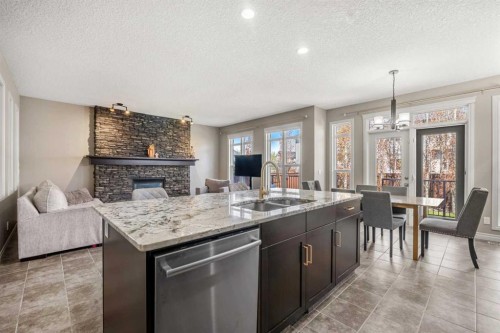 495 Cranford Drive Se, Calgary, AB - Indoor With Fireplace