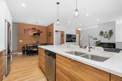 153 Savanna Walk Ne, Calgary, AB - Indoor Photo Showing Kitchen With Double Sink