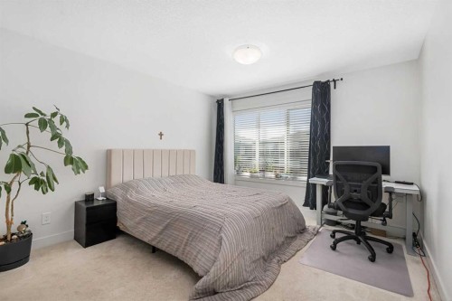 153 Savanna Walk Ne, Calgary, AB - Indoor Photo Showing Bedroom