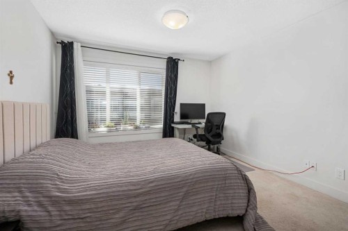 153 Savanna Walk Ne, Calgary, AB - Indoor Photo Showing Bedroom