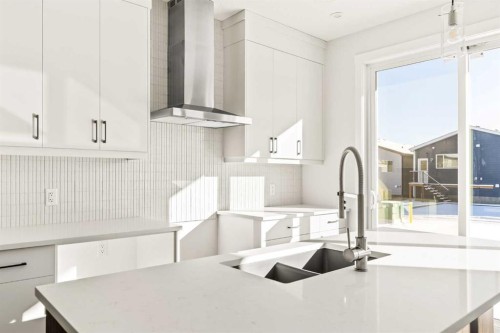 885 Livingston View Ne, Calgary, AB - Indoor Photo Showing Kitchen With Double Sink With Upgraded Kitchen