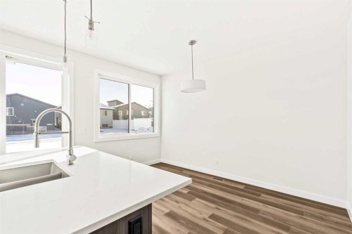 885 Livingston View Ne, Calgary, AB - Indoor Photo Showing Kitchen With Double Sink With Upgraded Kitchen