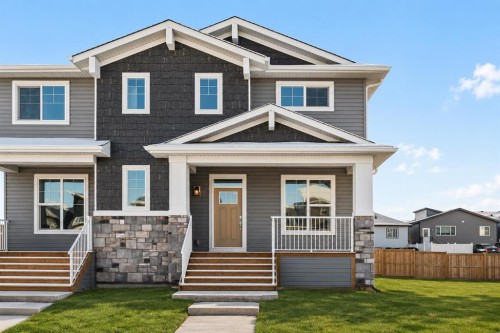 885 Livingston View Ne, Calgary, AB - Outdoor With Deck Patio Veranda With Facade