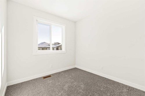 885 Livingston View Ne, Calgary, AB - Indoor Photo Showing Other Room