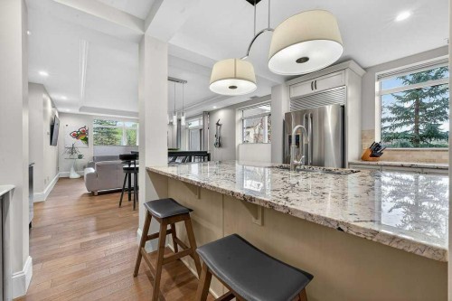 107-121 Quarry Way Se, Calgary, AB - Indoor Photo Showing Kitchen With Upgraded Kitchen