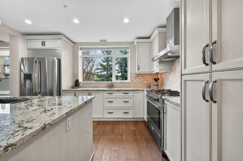 107-121 Quarry Way Se, Calgary, AB - Indoor Photo Showing Kitchen With Stainless Steel Kitchen With Upgraded Kitchen