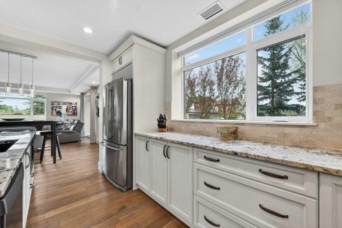 107-121 Quarry Way Se, Calgary, AB - Indoor Photo Showing Kitchen With Upgraded Kitchen
